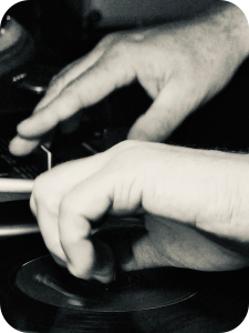 Strictly Wax Vinyl DJ adjusting the pitch using the deck spindle for fine control